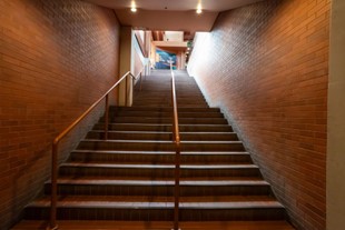 The view from the bottom of the stairs of the Churchill LRT station into the Citadel Theatre by the 102 Avenue (north) entrance.